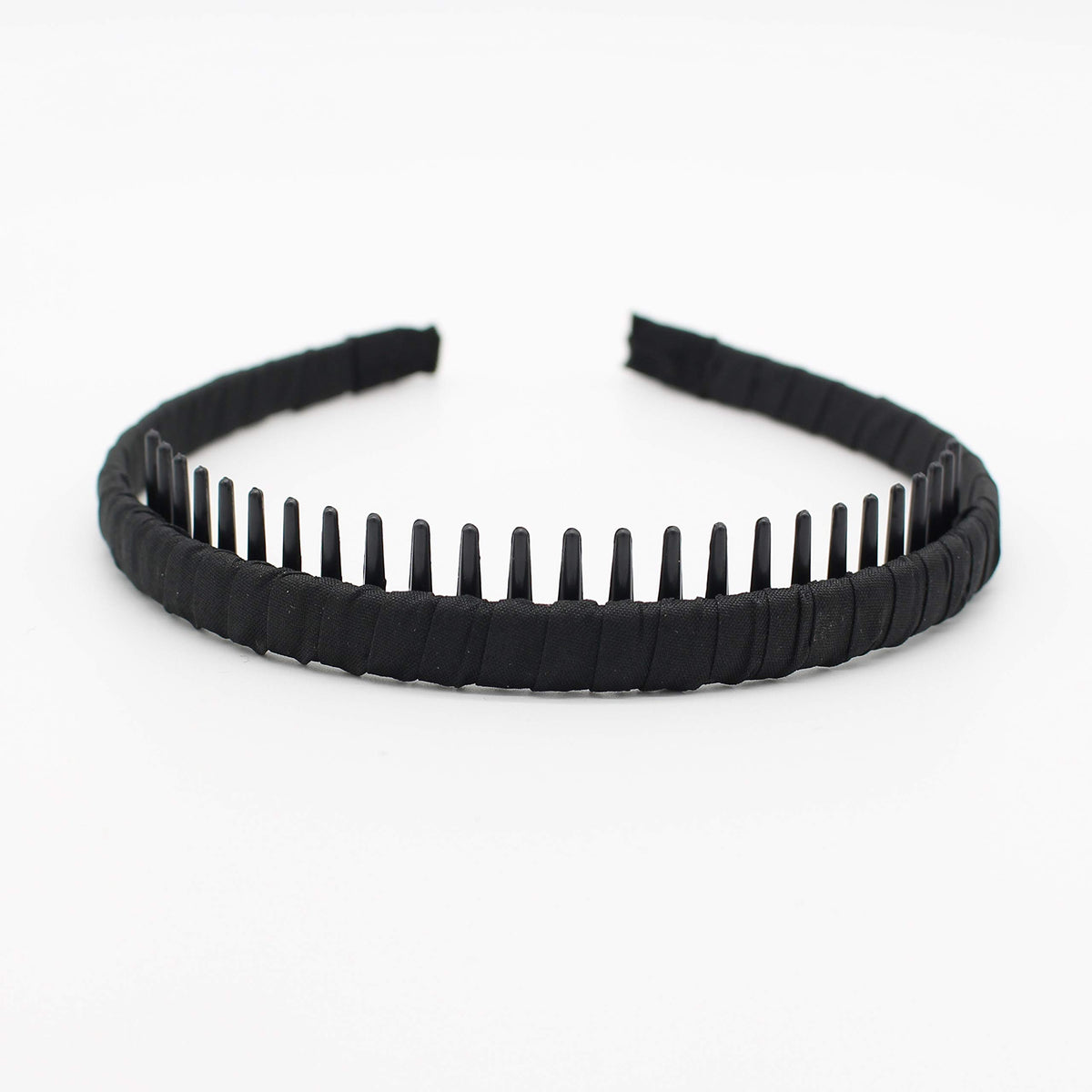 JOBAND headband next to coin for scale conveying slim compact size