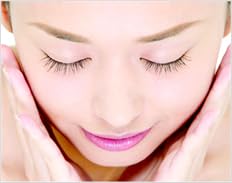 JOESOEF applying bar to face illustrating gentle cleansing step