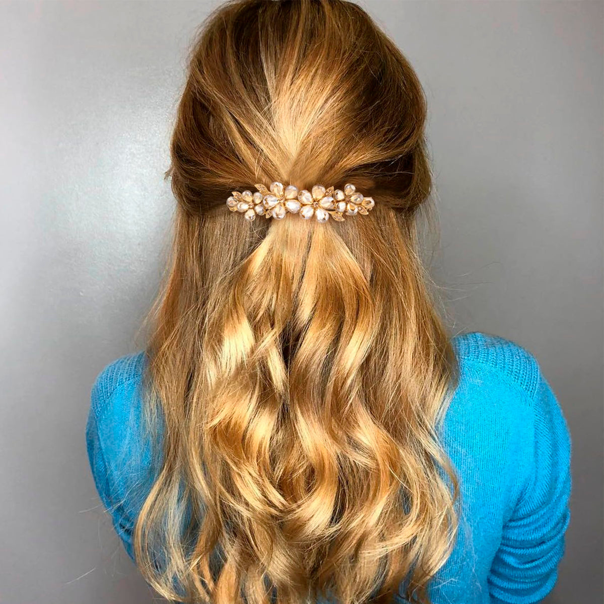 Joez Wonderful clip worn in half-up hairstyle adding polished accent