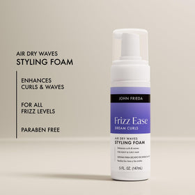 John Frieda foam in palms ready for application to distribute product evenly