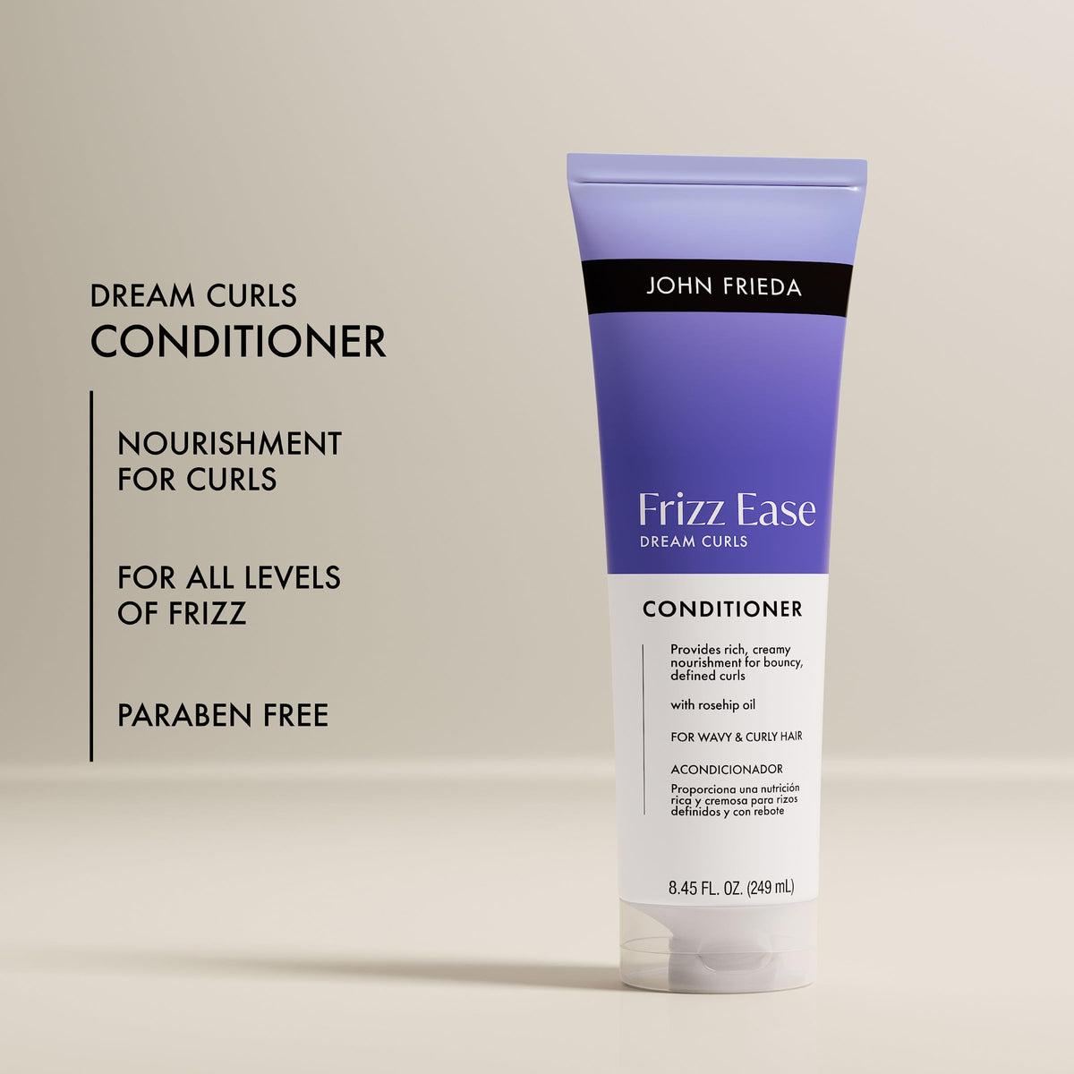 John Frieda conditioner detangling hair in hand for easier styling