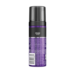 John Frieda styled beach waves on model showing soft, defined, frizz-free look