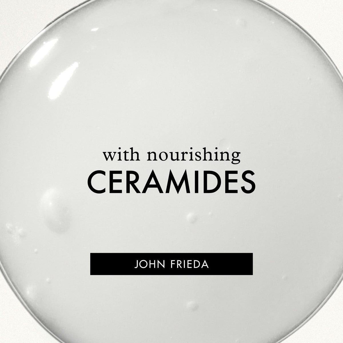 John Frieda bottle in hand for scale to show convenient 8 fl oz size