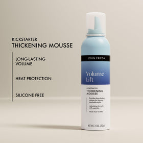 John Frieda mousse being blow-dried for lifted roots and long-lasting body