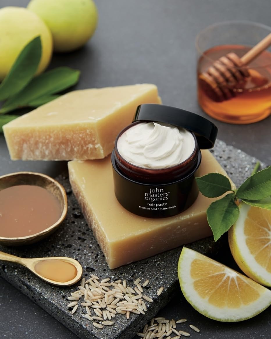 john masters organics open tin texture close-up illustrating creamy matte paste for styling