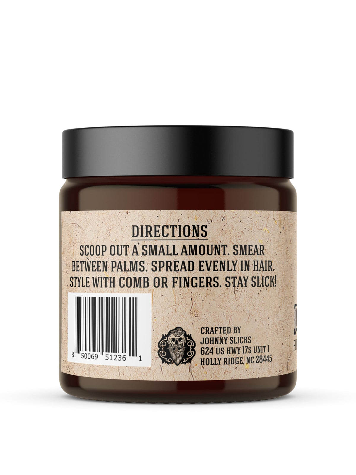 Johnny Slicks pomade on fingers demonstrating smooth application and control