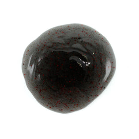 Johnny Slicks textured wash closeup showing exfoliating beads for smoother skin