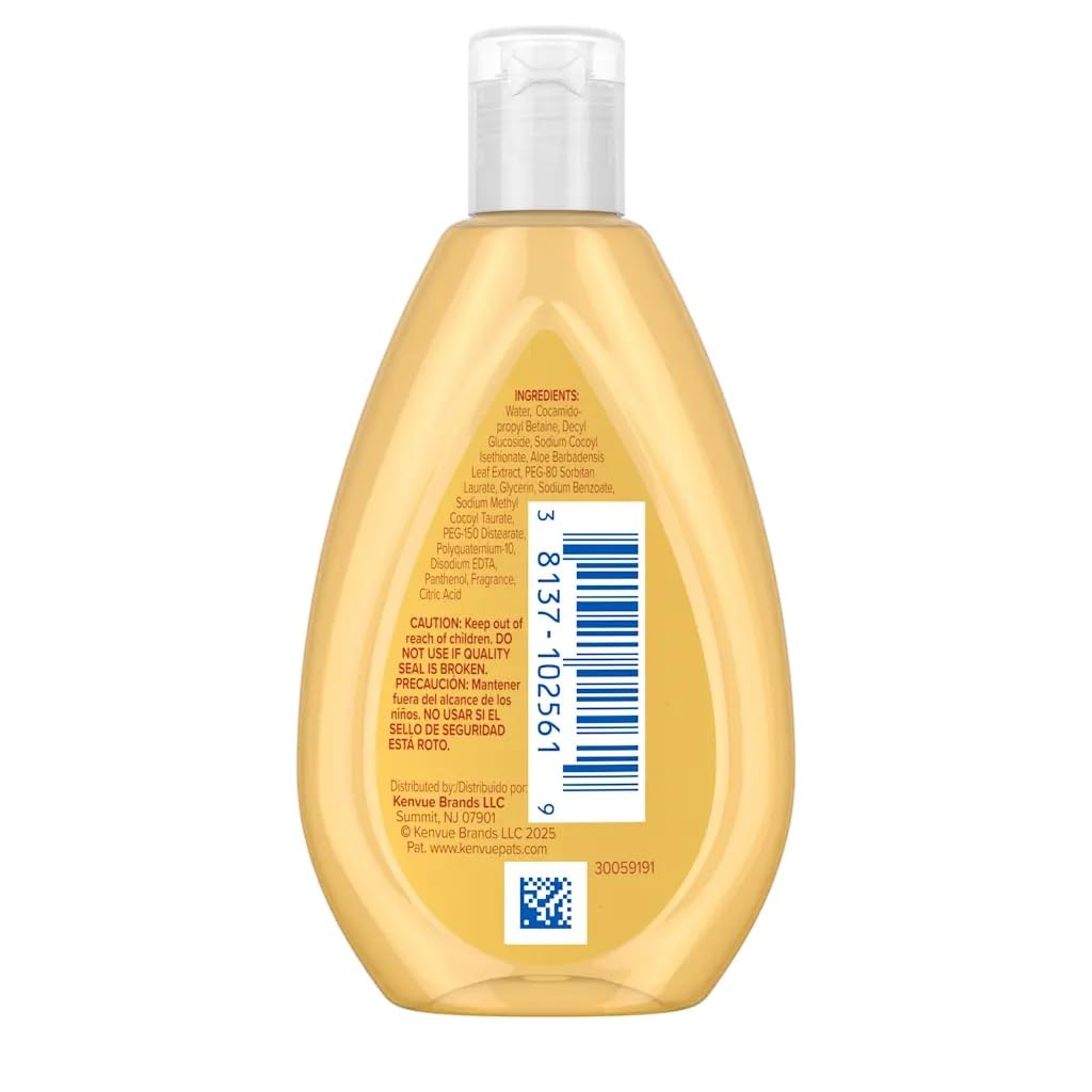Johnson's Baby bottle next to coin for 1.7 oz size reference