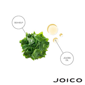 Joico conditioner being applied to thick hair in shower for deep hydration