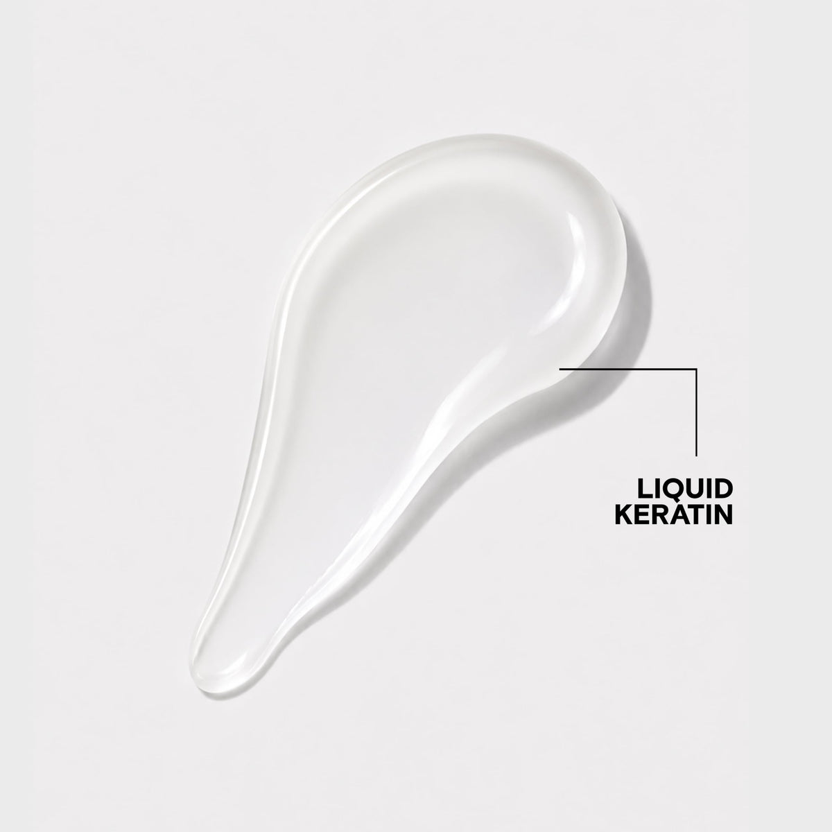 Joico bottle label detail highlighting liquid keratin and bonding tech benefit