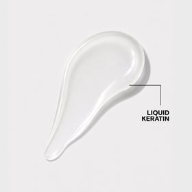 Joico bottle label detail highlighting liquid keratin and bonding tech benefit