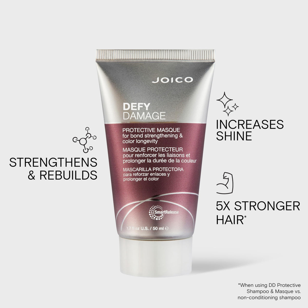 Applying Joico masque to mid-lengths and ends for visible softness and strength