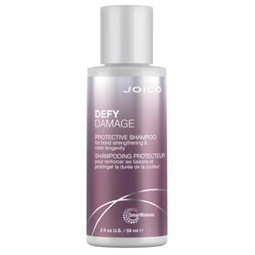 Close-up of Joico Defy Damage shampoo lather texture showing rich foam for gentle cleansing