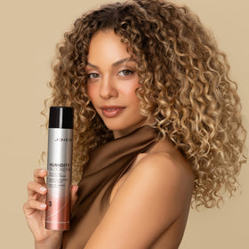 Joico bottle beside ruler showing 180mL size for travel-friendly use