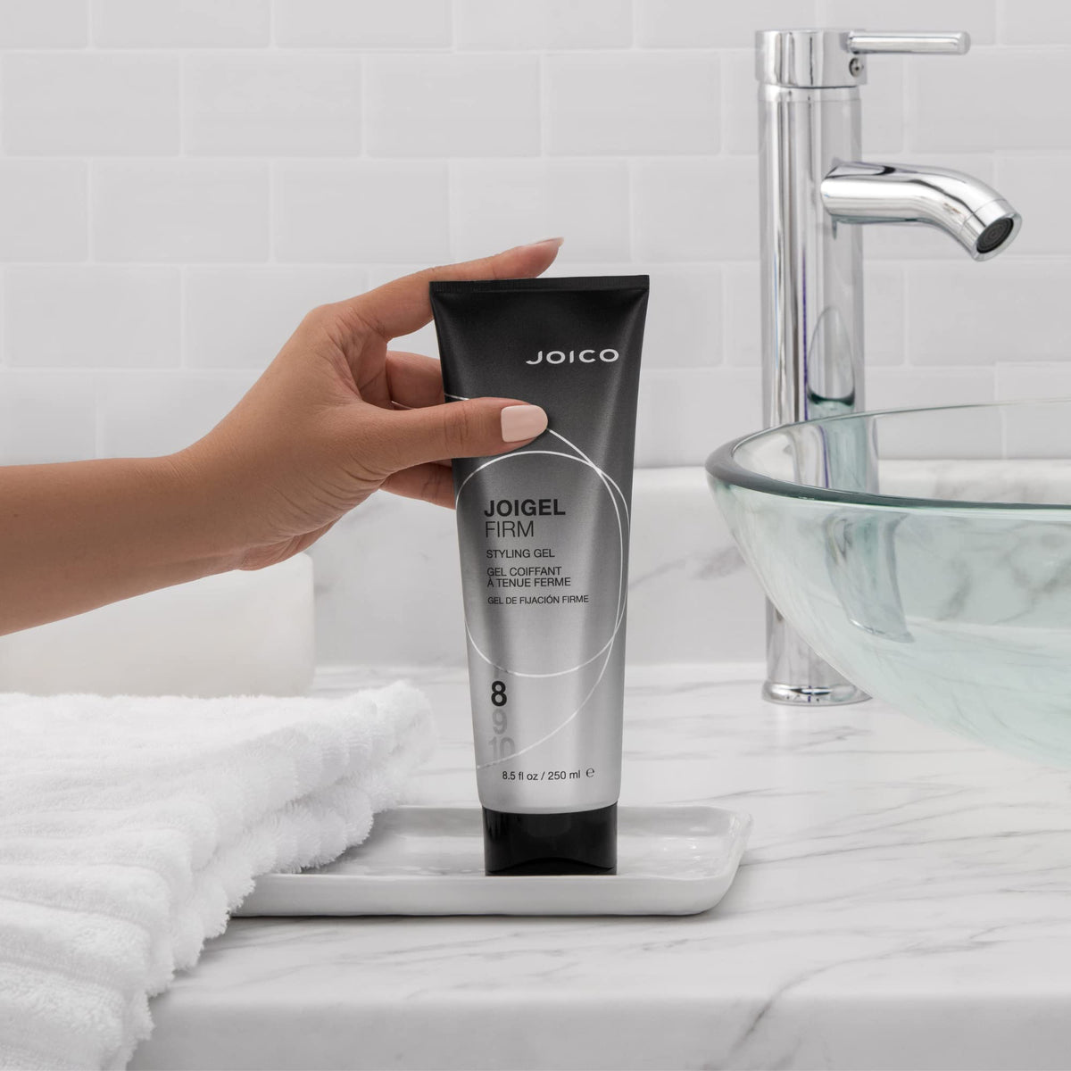 Joico JoiGel Firm used during blow-dry showing heat protection and styling help