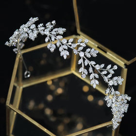 Jorsnovs tiara on an updo demonstrating styling versatility and event-ready look