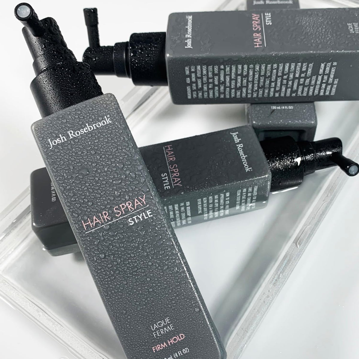 Josh Rosebrook bottle in hand for scale showing 120mL travel-friendly styling utility