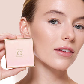 Close-up of Jouer Pink Bright ingredient label highlighting hyaluronic acid and green tea extract benefits