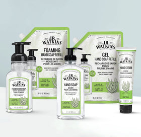 J.R. Watkins pouring refill into pump bottle for reduced plastic waste