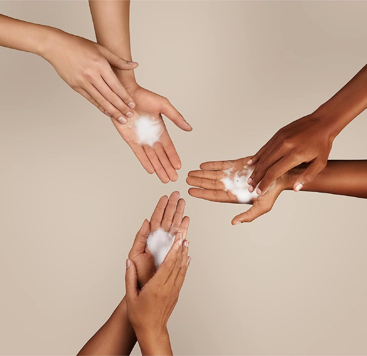 Close detail of J.R. Watkins creamy foam texture showing gentle lather