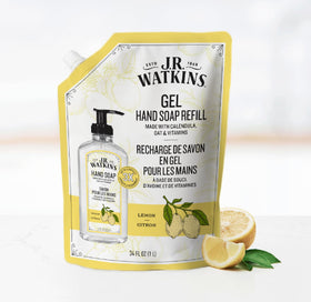 J.R. Watkins lathered foam in hands demonstrating moisturizing, gentle clean benefit