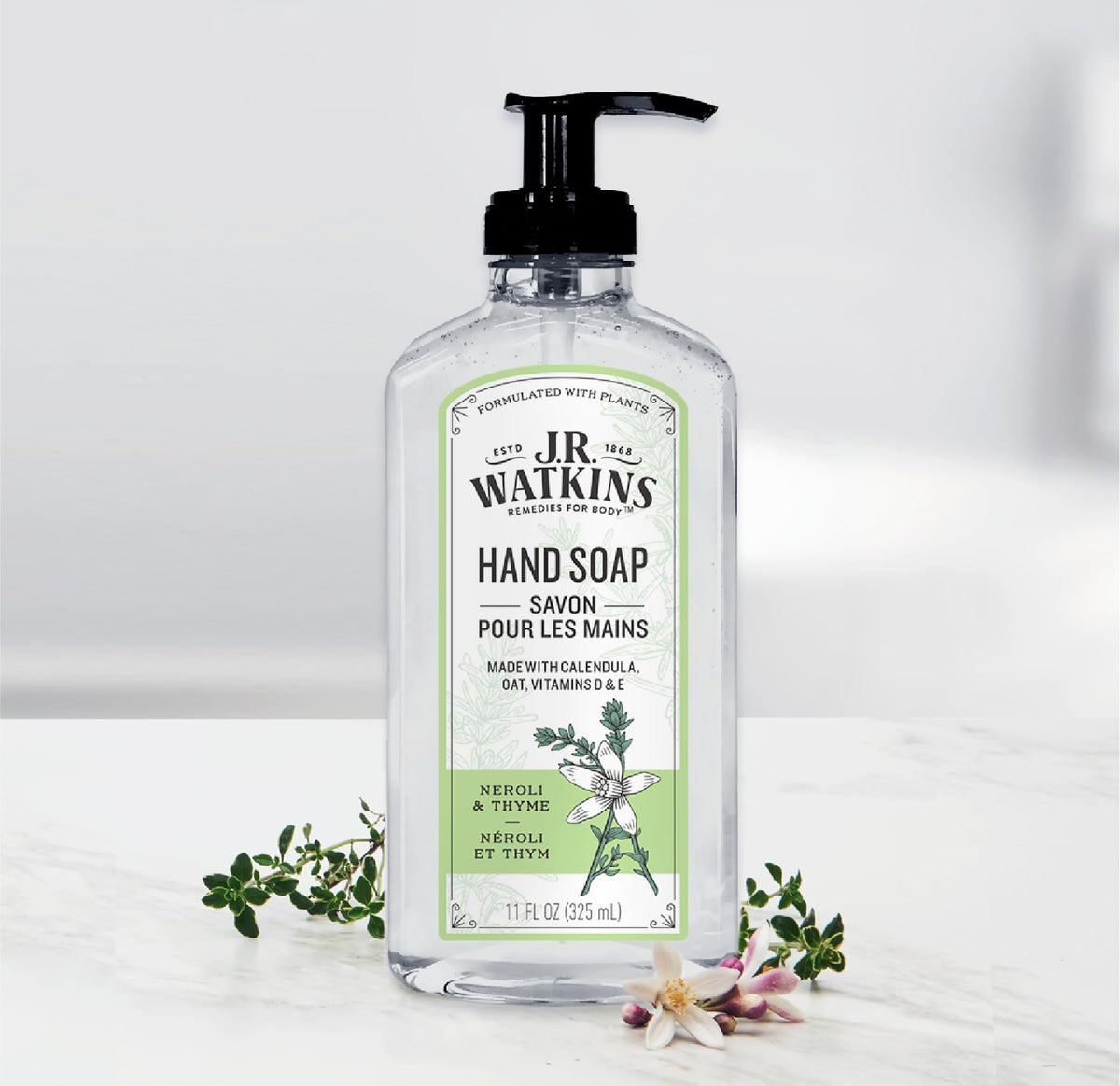 J.R. Watkins label detail highlighting plant-based ingredients and clean formula
