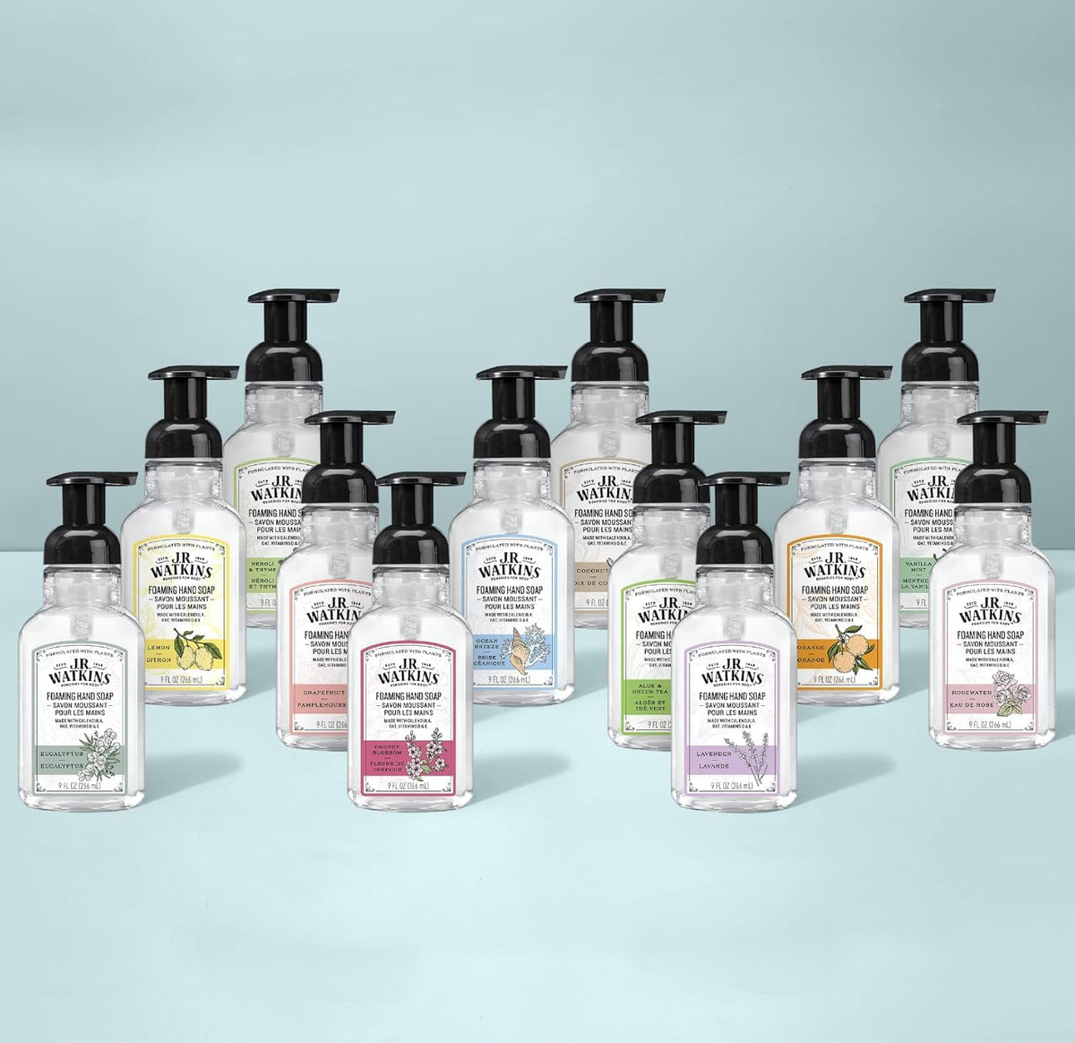 J.R. Watkins size comparison with hand showing 9 fl oz scale and travel-friendly benefit