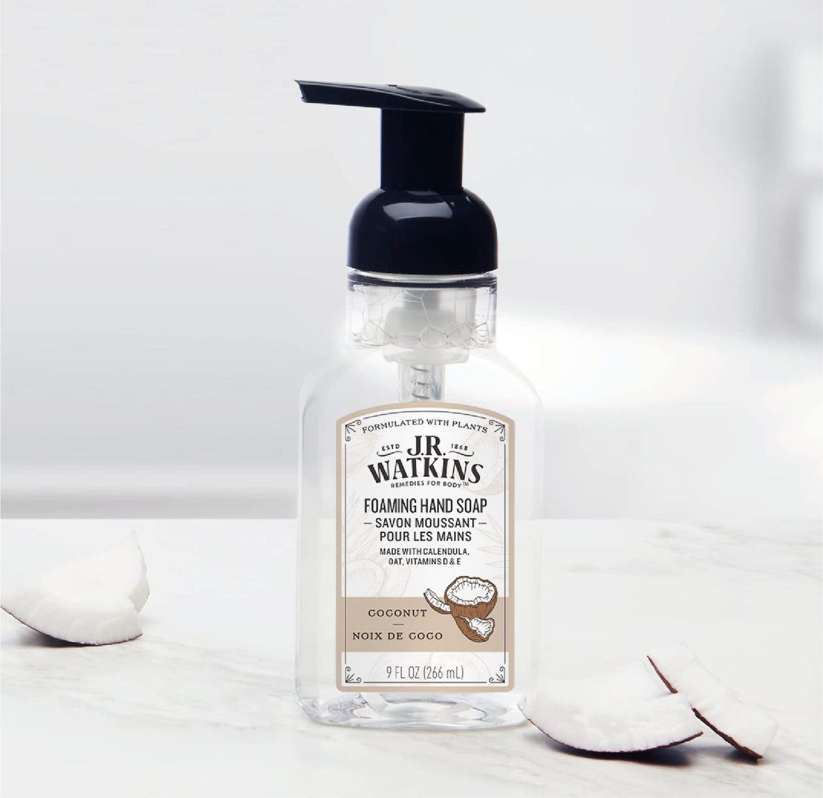 Three-pack of J.R. Watkins pumps on a bathroom counter for multi-sink use