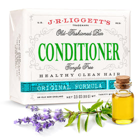 J·R·LIGGETT'S conditioner bar front packaging showing recyclable wrap and label benefits