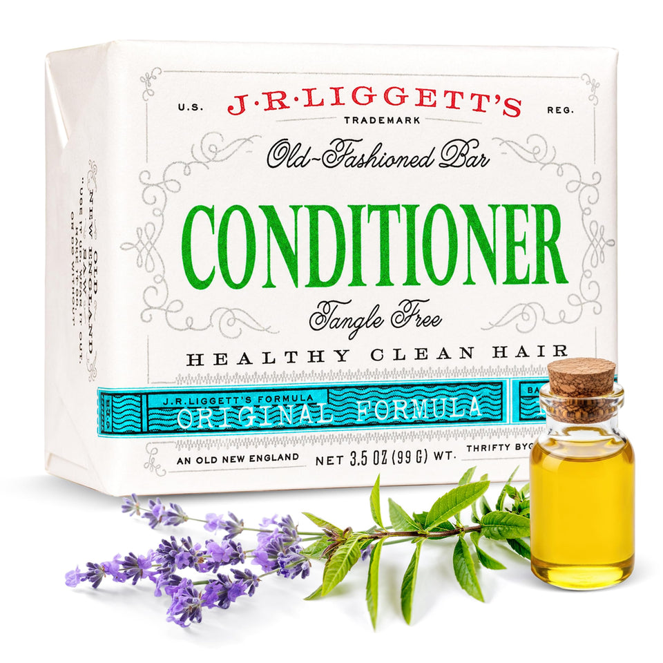 J·R·LIGGETT'S conditioner bar front packaging showing recyclable wrap and label benefits