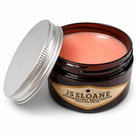 JS Sloane open jar displaying smooth pomade texture for easy application