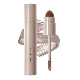 JUDYDOLL tube front view showing cool-toned contour and highlighter benefits