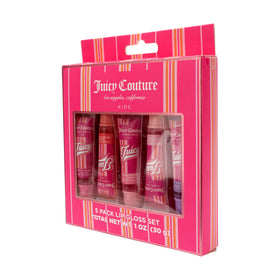 Juicy Couture tube beside a coin showing compact size and travel convenience