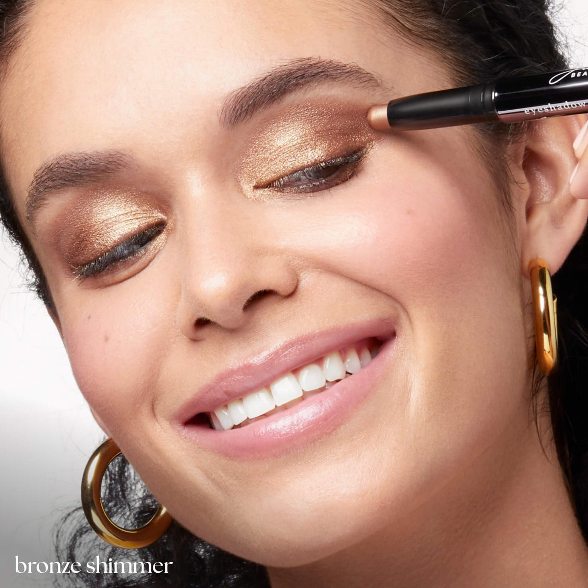 Julep arm swatch showing bronze pigment intensity and buildability