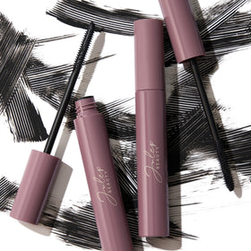 Julep applying mascara at mirror in lifestyle setting for everyday polished look