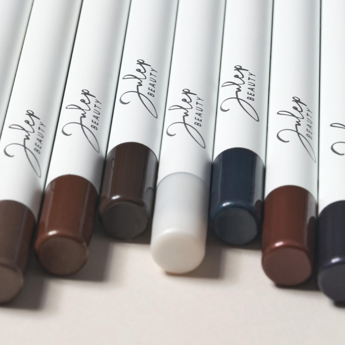 Julep eyeliner eye close-up showing Sage Grey shimmer enhancing natural eye color
