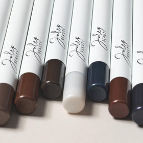 Julep eyeliner eye close-up showing Sage Grey shimmer enhancing natural eye color