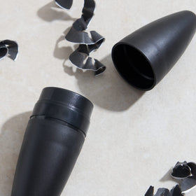 Julep sharpener beside travel pouch for on-the-go convenience