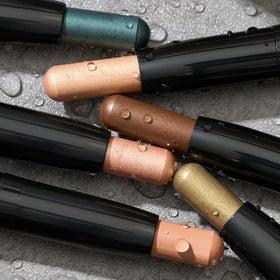 Julep travel-ready clutch shot showing secure caps and minimal-packing benefit