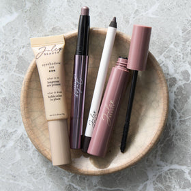 Julep travel-ready lifestyle on vanity illustrating on-the-go use