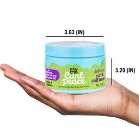 Just For Me 12 oz jar in hand for scale showing generous size and value benefit