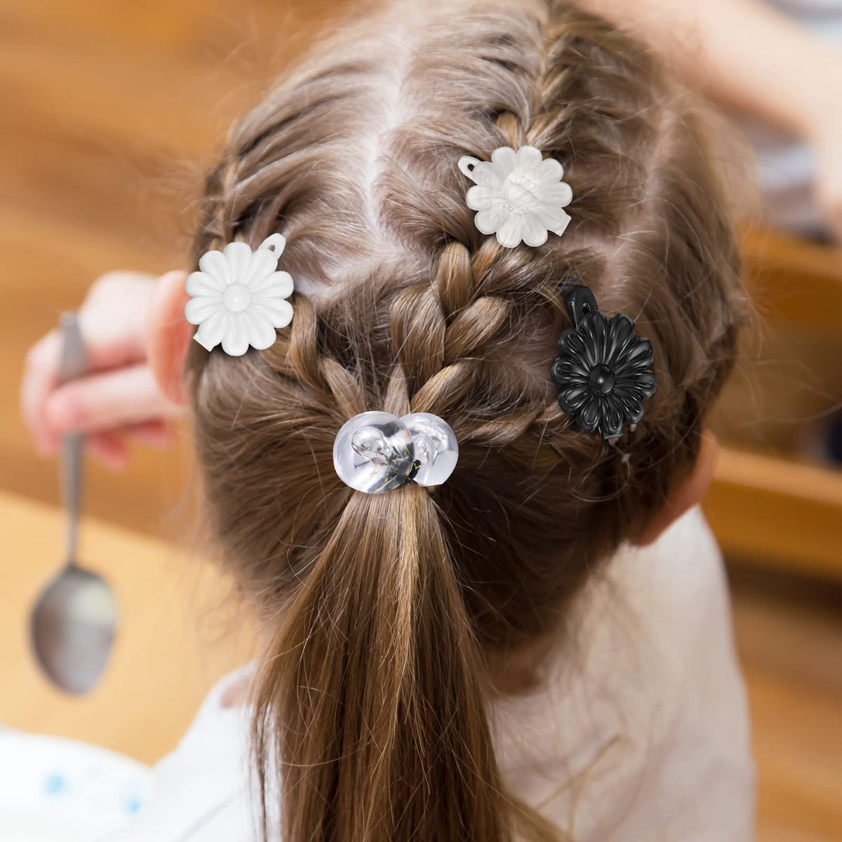 Jutom barrettes used in a child's ponytail adding retro style