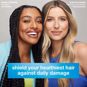 K18 being applied to hair mid-lengths showing smooth distribution and protection