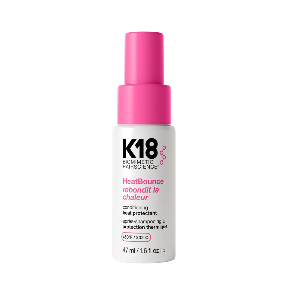 K18 bottle front view shows label and compact heat protectant travel size benefit