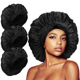 Kafteri front view showing three black jumbo bonnets protecting hair