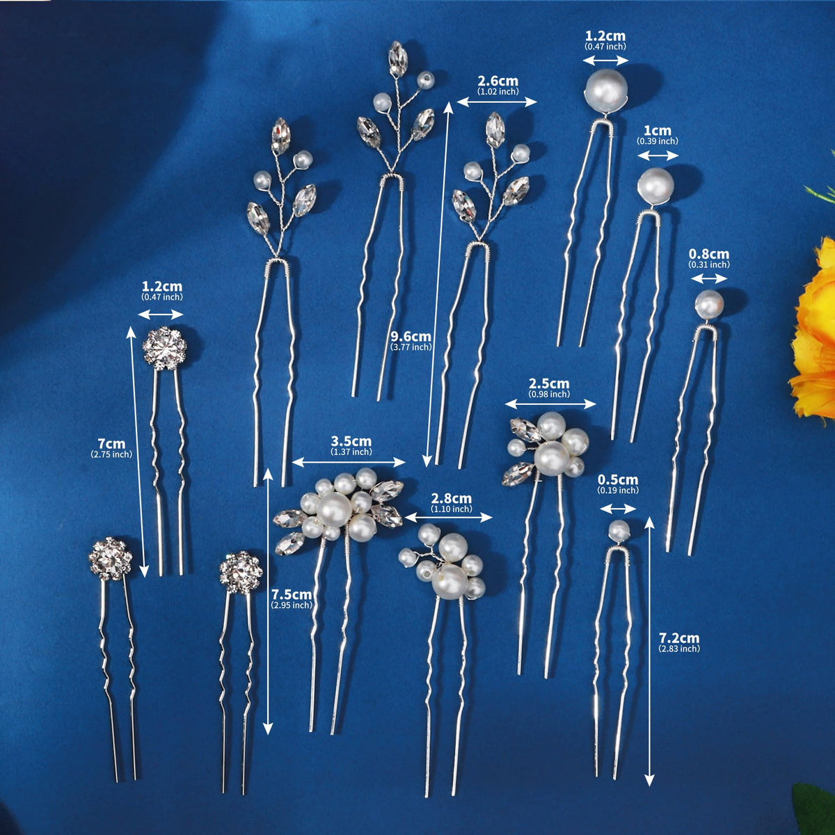 KALOLIA pins arranged on a veil showing complementary styling