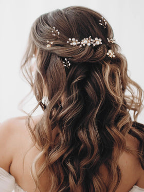 KALOLIA close-up of pearl and crystal cluster highlighting sparkle and refined detail benefit