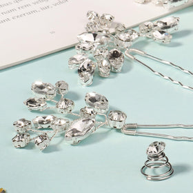 KALOLIA hairpins in an updo demonstrating secure decorative hold