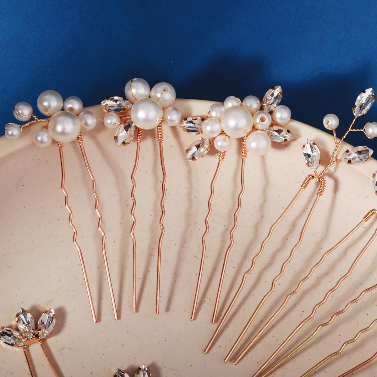 KALOLIA pins tucked into bridal updo showing subtle sparkle and finished look benefit photogenic styling