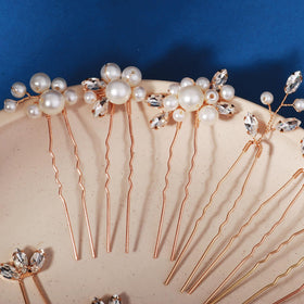 KALOLIA pins tucked into bridal updo showing subtle sparkle and finished look benefit photogenic styling